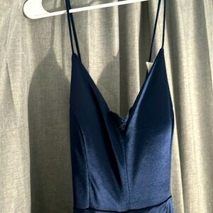 A beautiful prom dress in a size large women’s, never worn but lost tag.